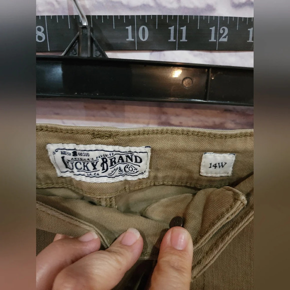 Lucky Brand green shorts with minor distresses details and subtle fray Size 14W - Picture 5 of 7